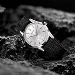 MB1 L01 Steel on black rock