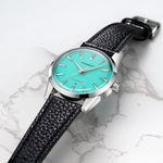 MB1 L06 Turquoise black strap on marble